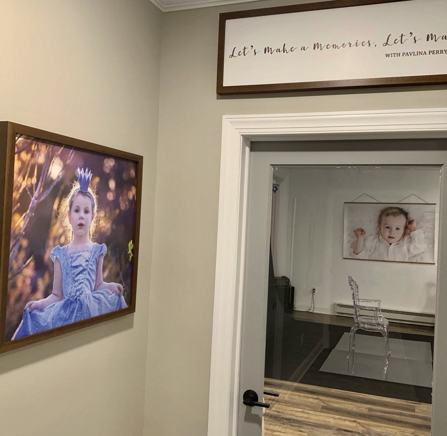 A glimpse into Pavlina’s studio, with framed portraits on the walls